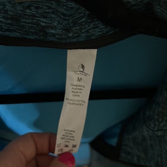 Zip up hoodie size medium, turquoise color with heathered appearance, smooth! - Picture 2 of 2